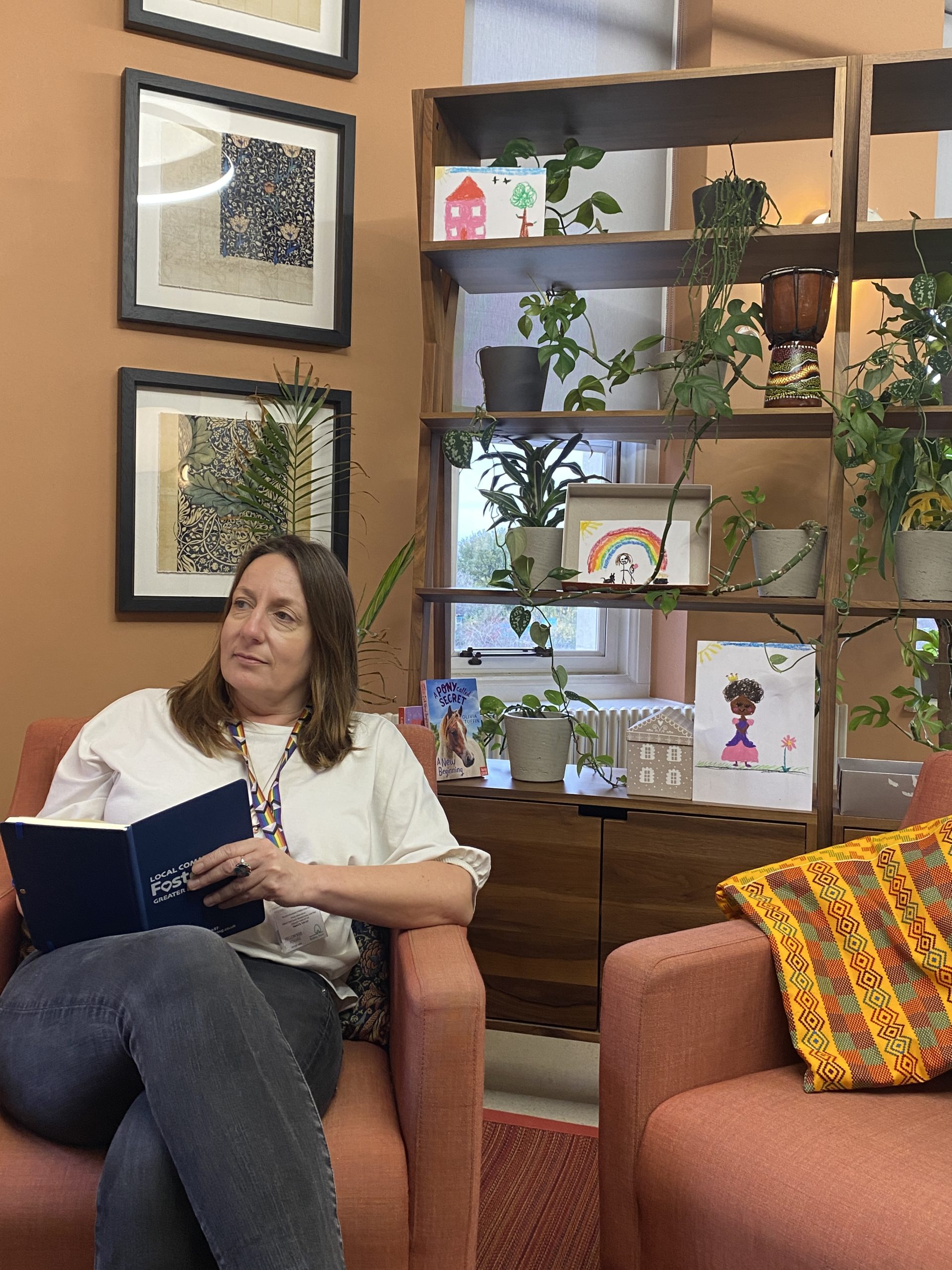 woman taking notes in a notebook